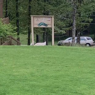 a sign in a park