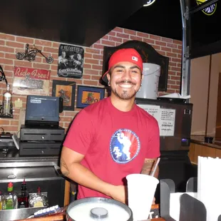 a man in a red shirt and a red hat