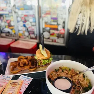 a bowl of food and a sandwich