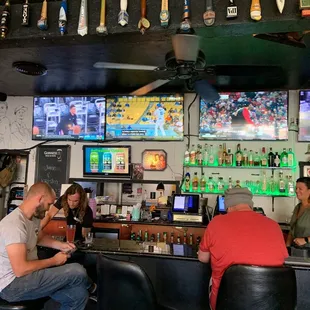 people sitting at the bar