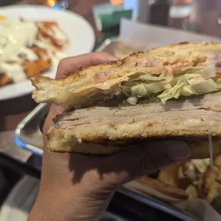 Tucson Turkey - looks and acts like deli Turkey vs "house roasted". Somewhat flavorless sammie, greasy sourdough fell apart.