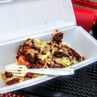 a meal in a styrofoam container
