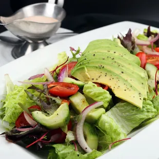 a salad with avocado