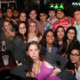 a group of people posing for a picture
