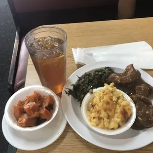 Smothered Chicken, Mac and cheese, greens, yams and sweet tea...