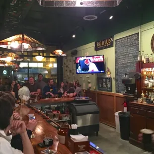 people sitting at the bar