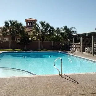 The outdoor pool is a non-heated saltwater pool and also has the laundry facilities located in the same vicinity.