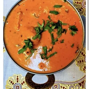 Chicken tikka masala description from their online website. Does not contain any information about peanuts.