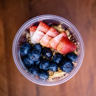a bowl of fruit and granola