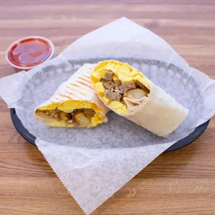 Awesome Breakfast Burrito! Shown with sausage. Egg whites and turkey sausage available also!