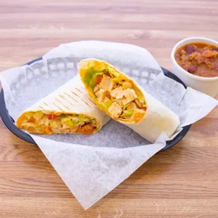 Let&apos;s get spicy! Buffalo Chicken Wrap shown with super yummy chili as a side! Call for daily soup specials also!