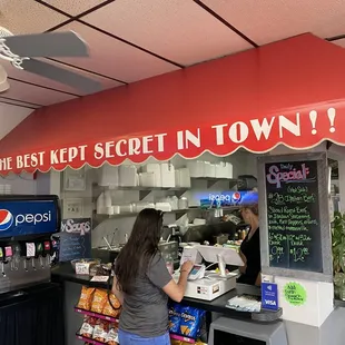 ows a woman at a counter