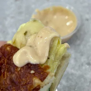 BYO breakfast sandwich on cheddar bagel, with bacon, pepper jack cheese, spinach, mushrooms and d egg-side of chipotle mayo to top off.