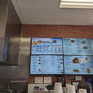 menus on a brick wall