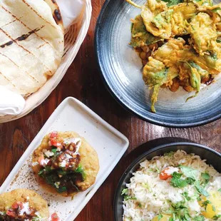 Flatbread, kachori chaat, basmati rice, chickpeas and crispy spinach