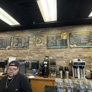 Menu and very kind proprietor