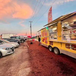 a food truck parked in a parking lot