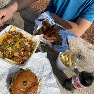 a man sitting at a picnic table
