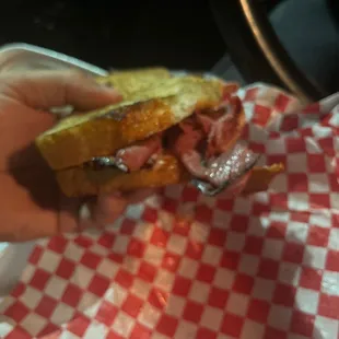 Sadness is what is in this photo.  Sad looking sandwich.