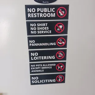 no public restroom no shoes no hand washing no loitering no pets allowed no soliciting no soliciting