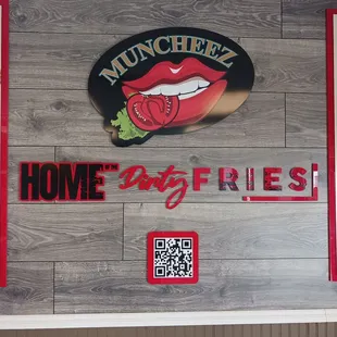 a sign for a hot dog fries restaurant