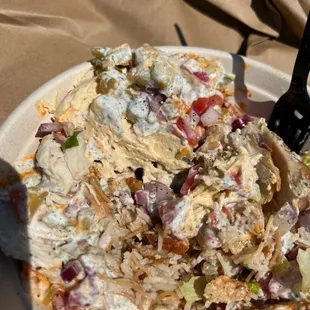a plate of food with a fork in it