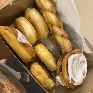 What I got!! 2 Glazed cinnamon twisties, 2 cinnamon rolls, 2 chocolate covered donuts, 2 glazed donuts and a stuffed apple pie donut.