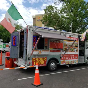 a food truck parked in a parking lot