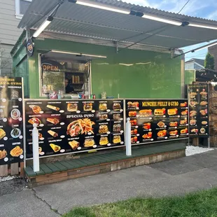 a food truck with menus