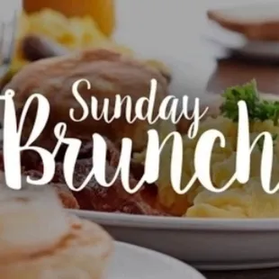 a plate of breakfast food with the words sunday brunch