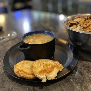 Chicken and rice soup and it was delicious as were the little bread slices.