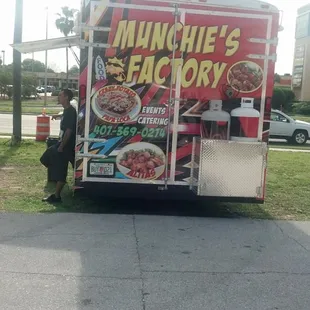 a food truck parked on the side of the road