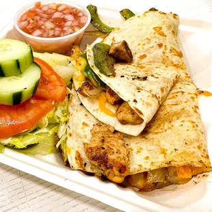 Chicken Quesedilla served with House Salad and Pico De Gallo.