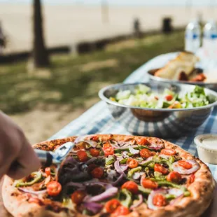 We offer Pizza, Salads, Wings, Subs, and more!