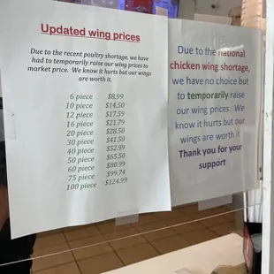 a sign in a restaurant window