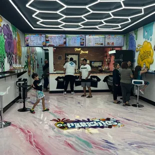 a group of people in a munchy restaurant