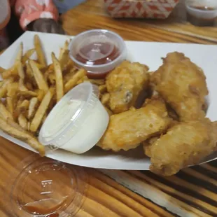 Breaded wings and fries