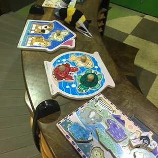 Worn out puzzles, many missing pieces