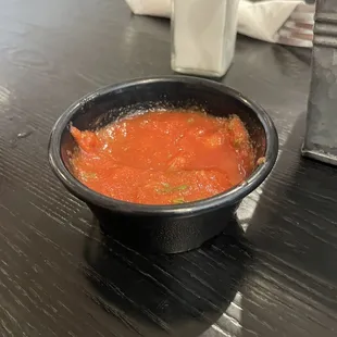 a bowl of tomato sauce