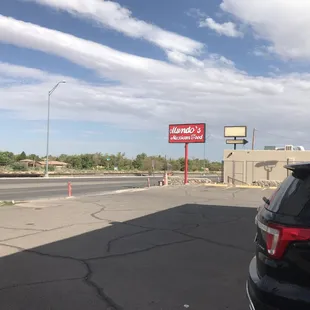 a car parked in front of a restaurant
