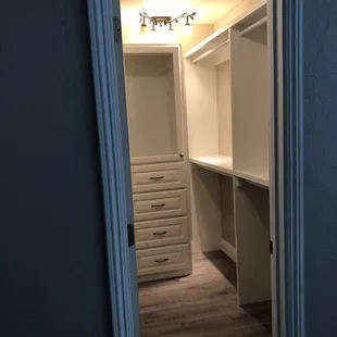 After. 4 large hanging areas and custom glass purse cabinet and drawers