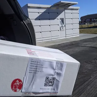 a delivery truck with a box on the back