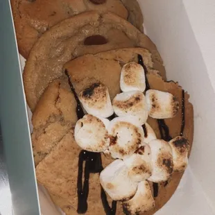 2 chocolate chip cookies and one s&apos;mores cookie