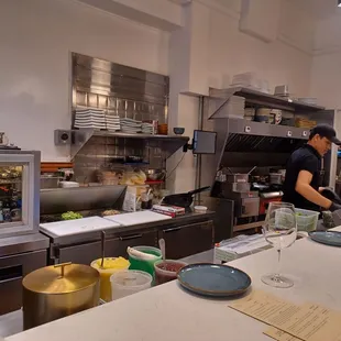 a man preparing food in a kitchen