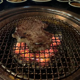 Grilling the pork neck on the grill!