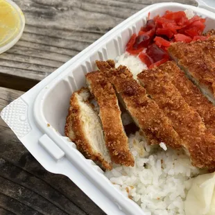 a meal in a styrofoam container