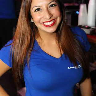 a woman in a blue shirt