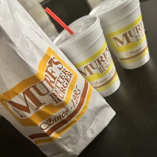 three cups of coffee on a table