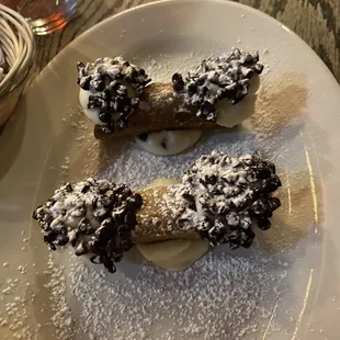 two bananas covered in powdered sugar