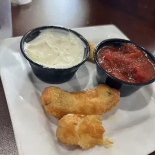 Cheese curds with ranch and marinara